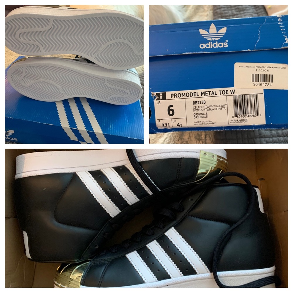 Women’s adidas size 6 gold shell toe. Black with white stripes. New in box